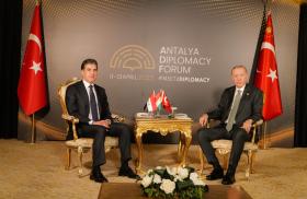 Barzani and Erdogan sitting across from each other, April 2025